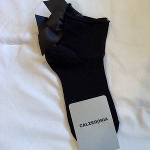 Black ankle socks with bows on the back